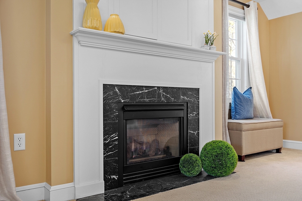 40 Bellevue Road Andover, MA 01810 - Photo 22 of 42 a living room with furniture and a fireplace