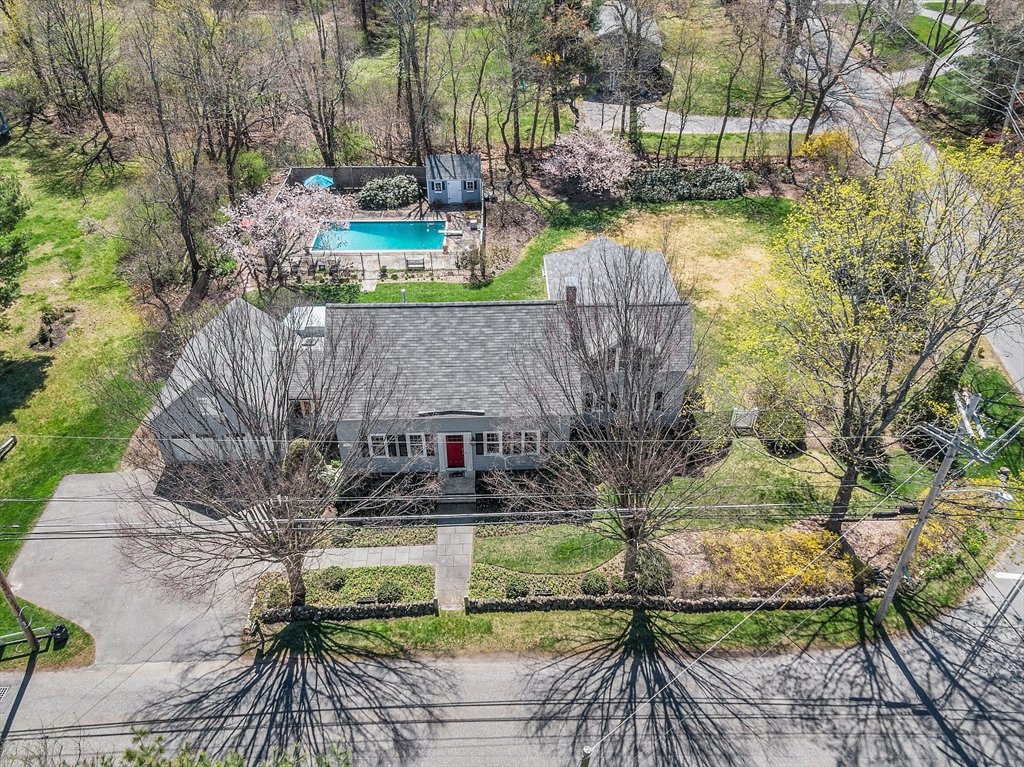 40 Bellevue Road Andover, MA 01810 - Photo 40 of 42 a view of house with a yard and potted plants