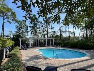 Lot I-14 Lot I-14 Mallard Lane Santa Rosa Beach, FL 32459 - Photo 4 of 15 a view of a house with swimming pool and a yard