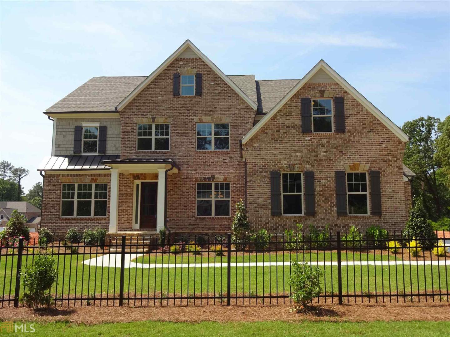 621 Mabry Road, Unit 12 Sandy Springs, GA 30328 - Photo 1 of 1 The Bayberry "L" welcomes you home with a beautiful brick and cedar shake exterior, covered front porch & 3 car garage.