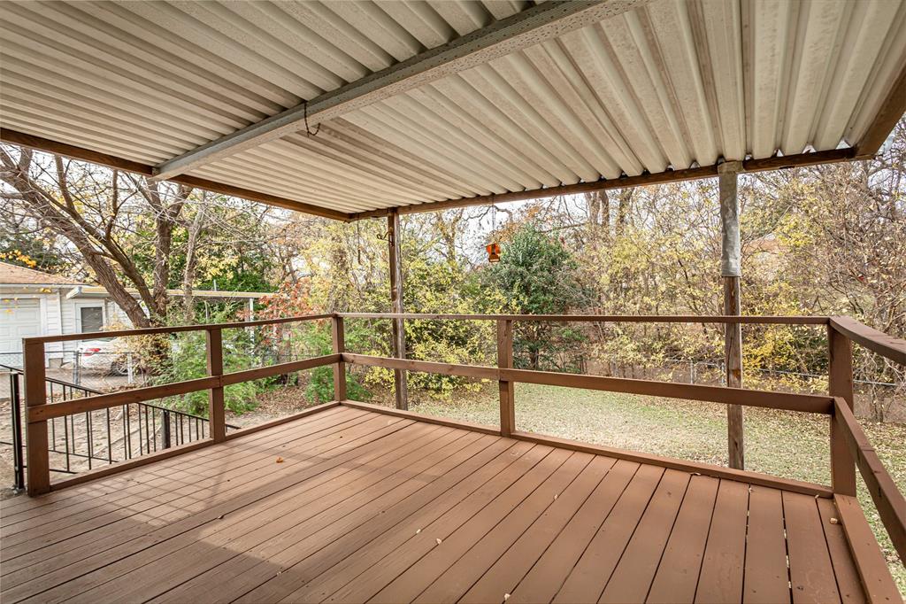 3311 Tooms Street Dallas, TX 75227 - Photo 33 of 38 a view of a balcony with wooden floor