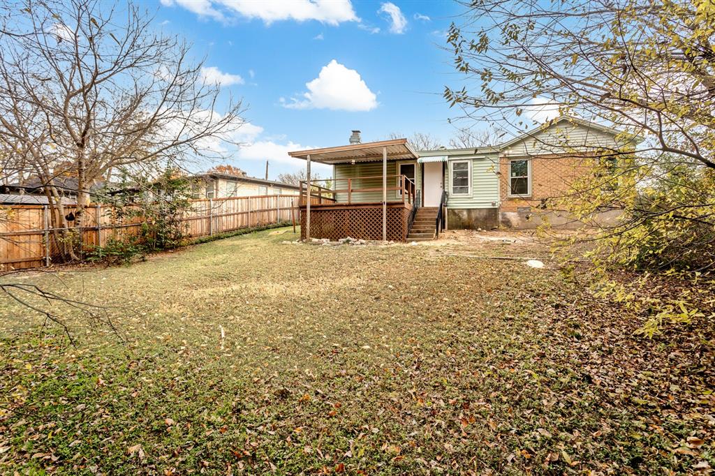 3311 Tooms Street Dallas, TX 75227 - Photo 35 of 38 a view of a house with a yard