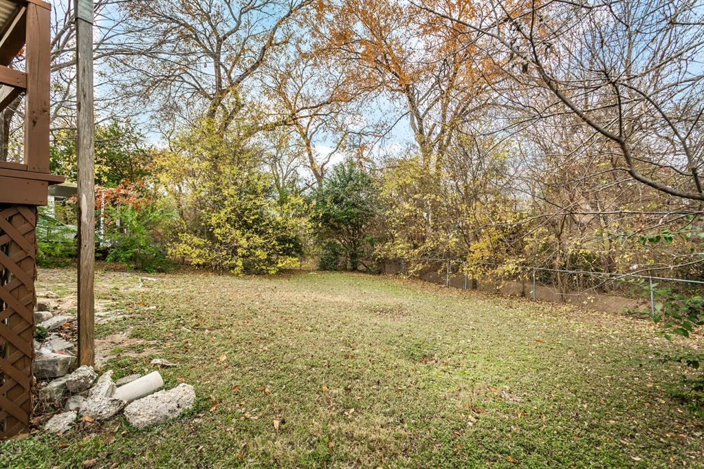 3311 Tooms Street Dallas, TX 75227 - Photo 37 of 38 a view of a yard with an outdoor space