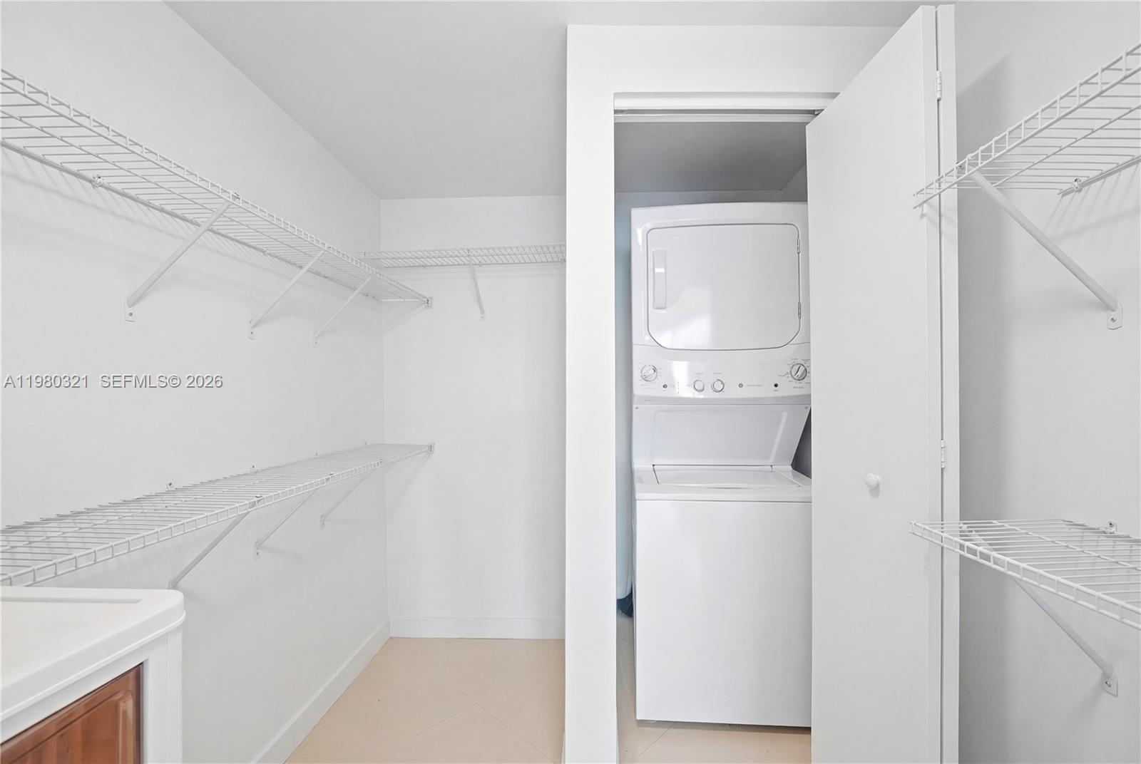 60 Southwest 13th Street, Unit 4414 Miami, FL 33130 - Photo 23 of 56 a view of washer and dryer