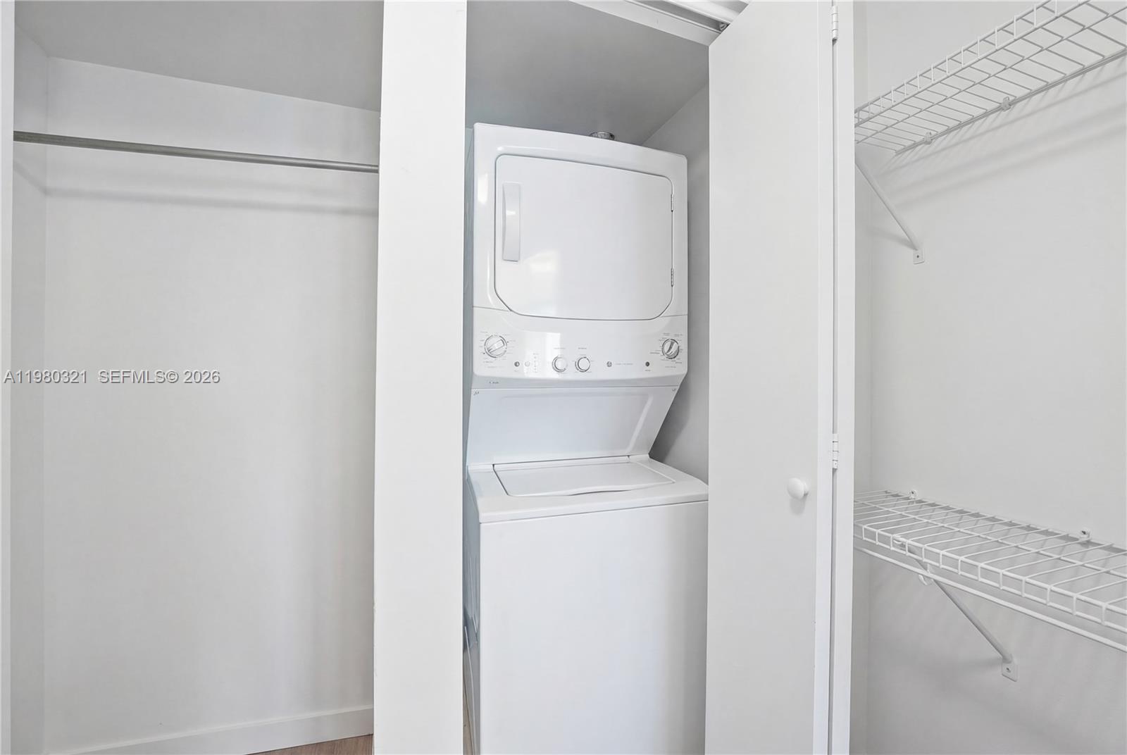 60 Southwest 13th Street, Unit 4414 Miami, FL 33130 - Photo 24 of 56 a utility room with dryer and washer