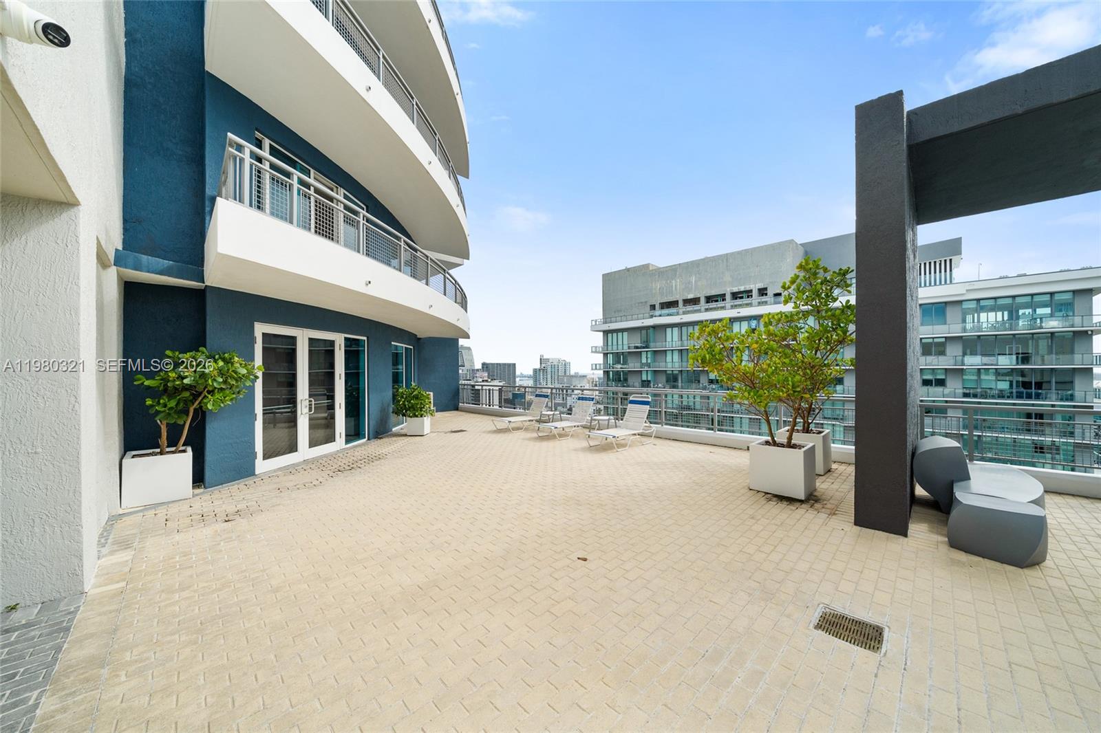 60 Southwest 13th Street, Unit 4414 Miami, FL 33130 - Photo 30 of 56 a view of a building with porch