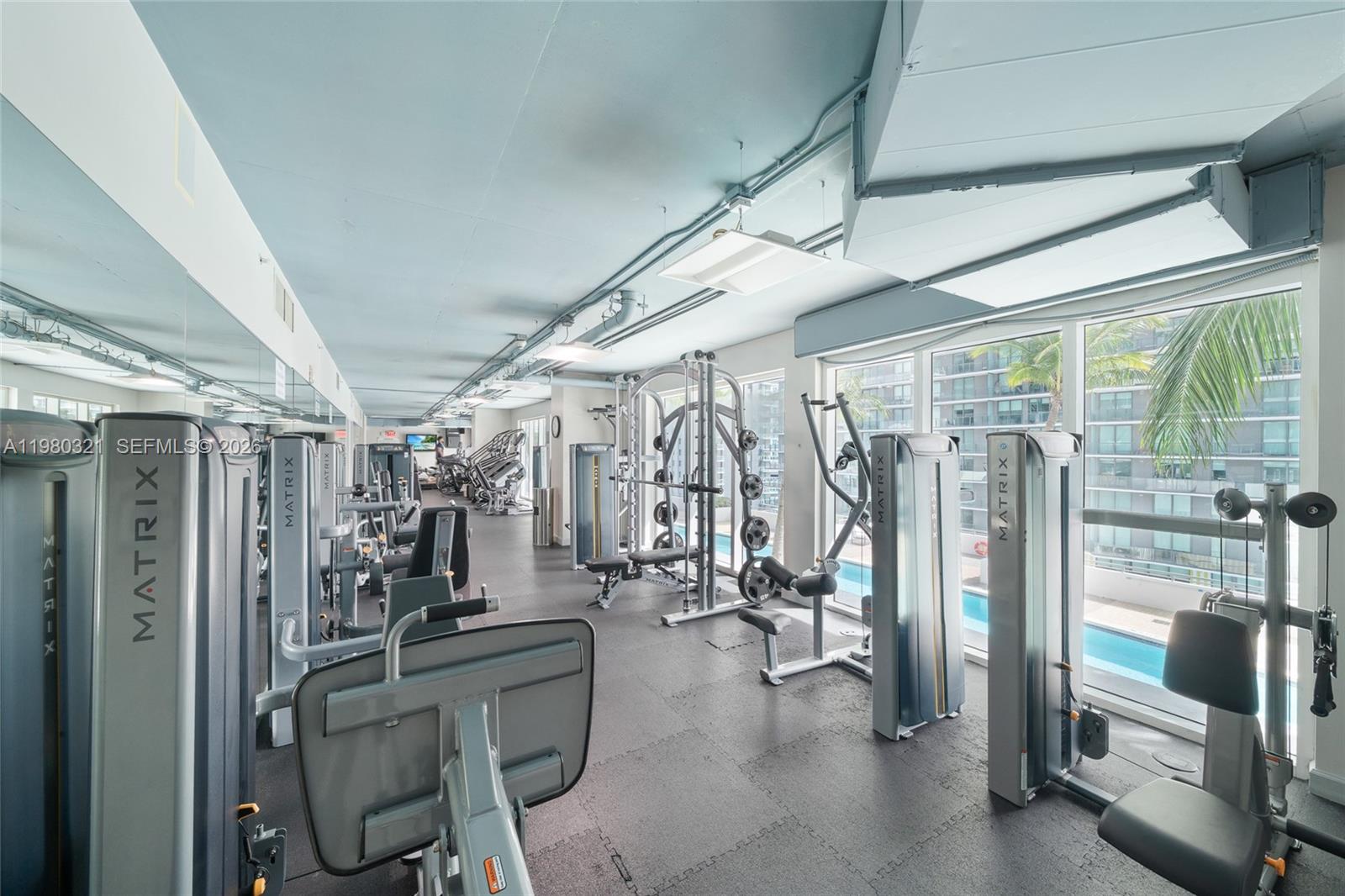 60 Southwest 13th Street, Unit 4414 Miami, FL 33130 - Photo 35 of 56 a view of a room with gym equipment
