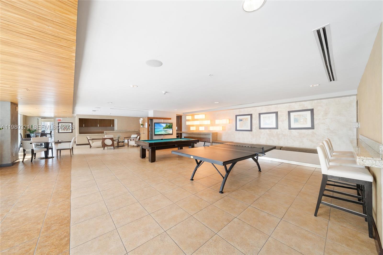 60 Southwest 13th Street, Unit 4414 Miami, FL 33130 - Photo 40 of 56 a living room with furniture and a table