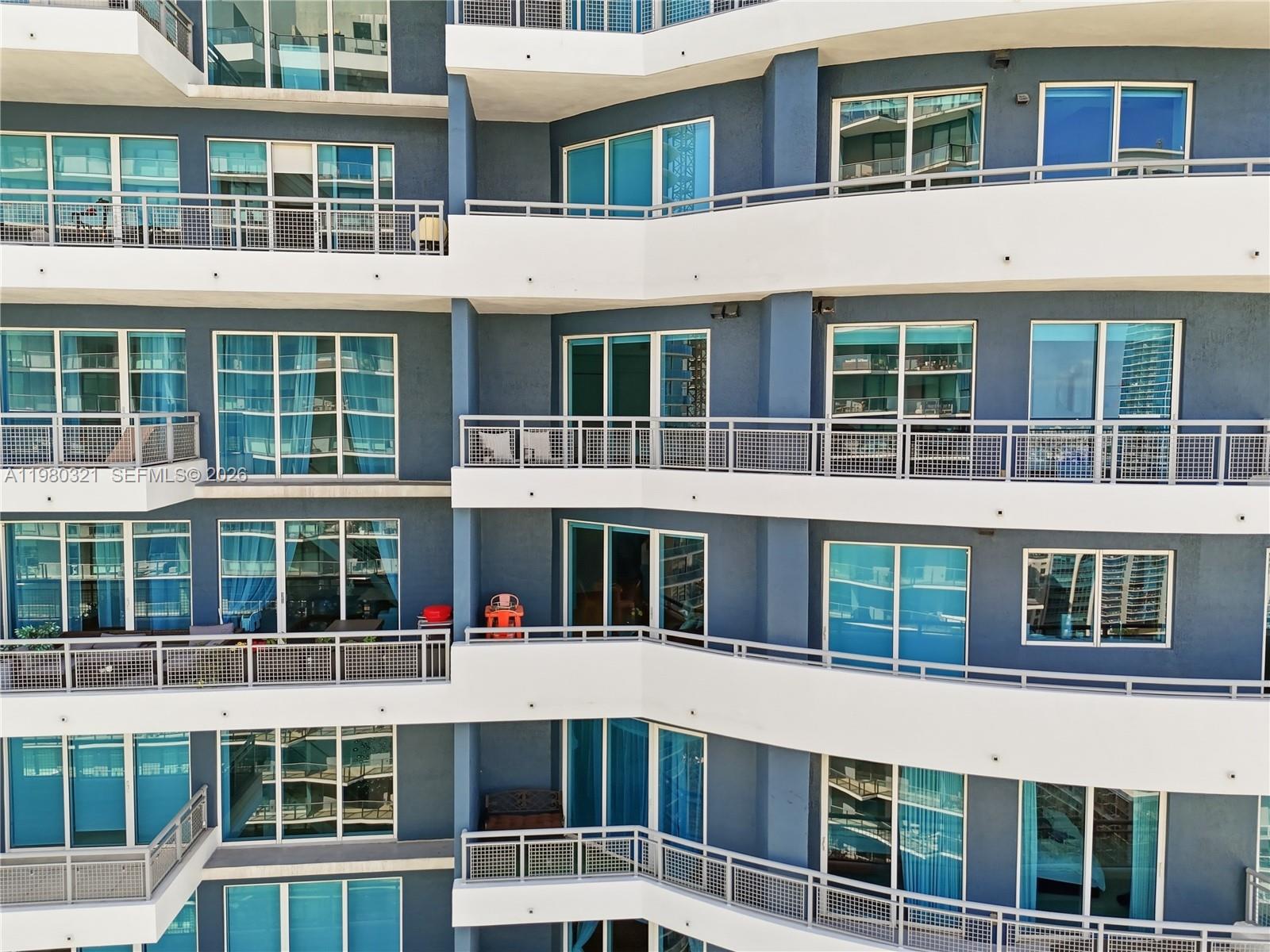 60 Southwest 13th Street, Unit 4414 Miami, FL 33130 - Photo 4 of 56 a view of a building with a large window