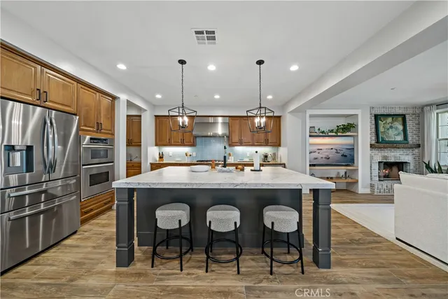 a kitchen with a table and chairs in it