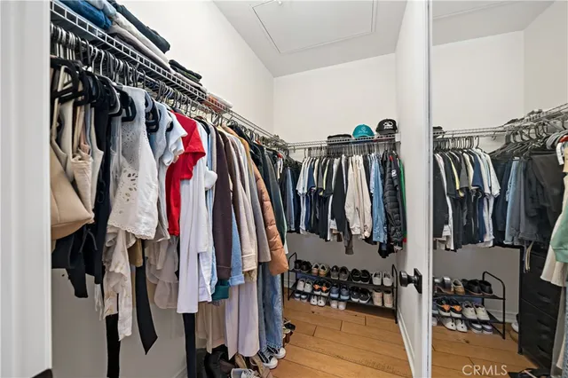 a view of a small space with wooden floor