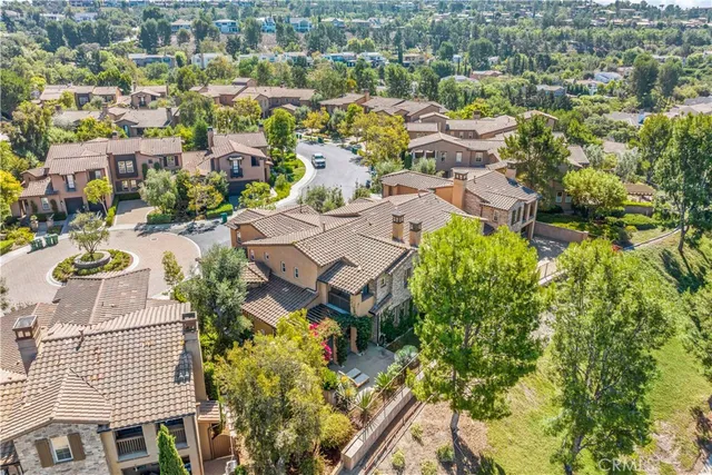 a utility room with multiple dryer and washer