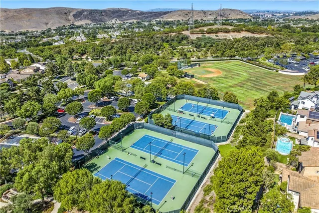 a view of a swimming pool with a garden