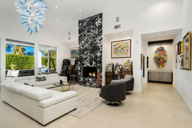 a room with gym equipment and a large window