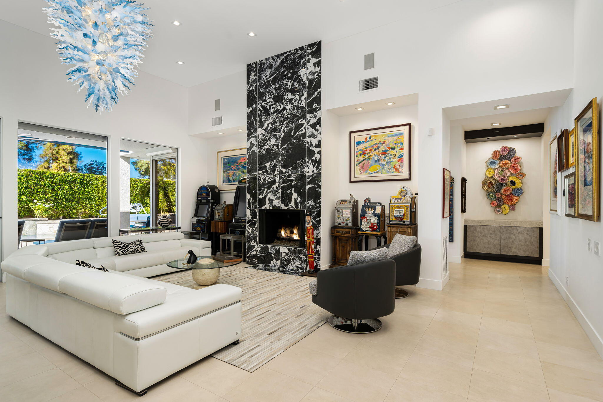 105 Waterford Circle Rancho Mirage, CA 92270 - Photo 18 of 76 a living room with furniture and a large window