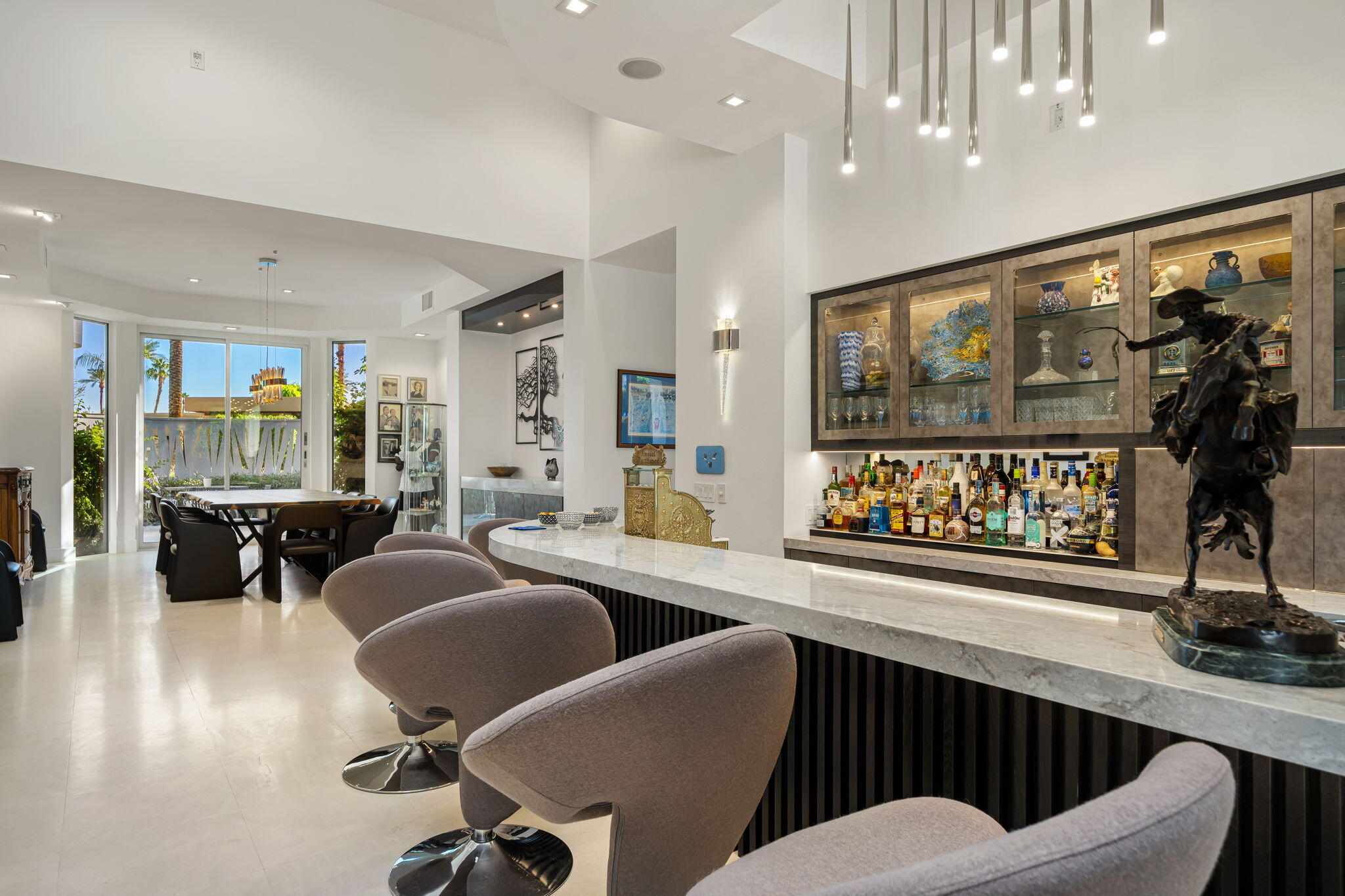 105 Waterford Circle Rancho Mirage, CA 92270 - Photo 26 of 76 a living room with furniture and a flat screen tv