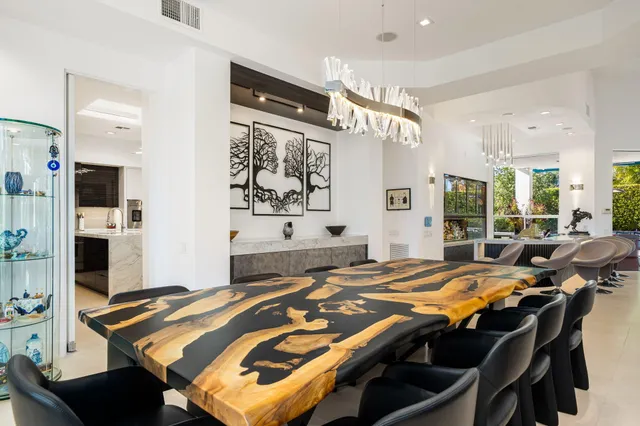 a view of a living room and kitchen