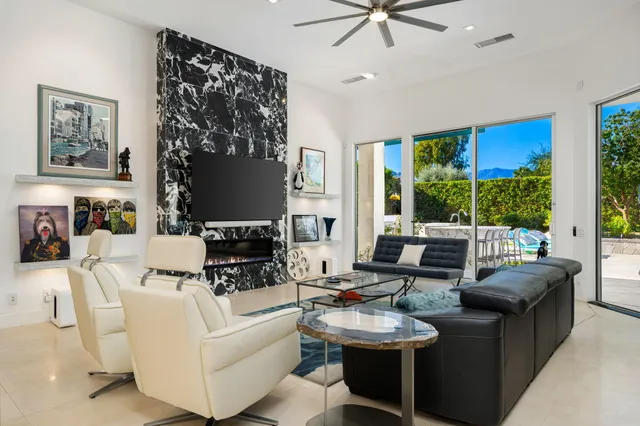 a view of a swimming pool with a patio