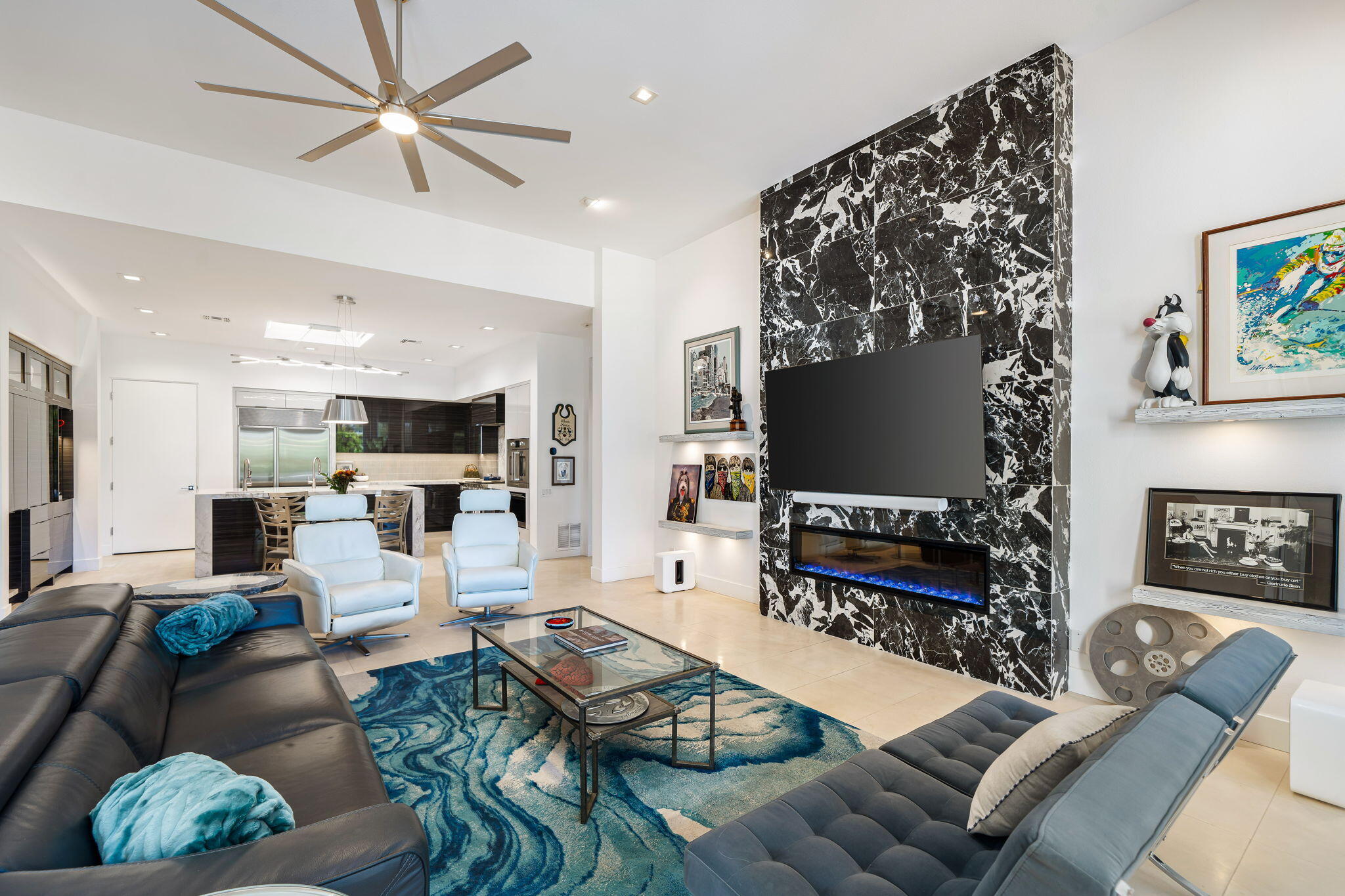 105 Waterford Circle Rancho Mirage, CA 92270 - Photo 36 of 76 a living room with furniture and a flat screen tv