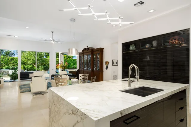 a bathroom with a tub sink and a mirror