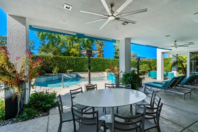 a utility room with sink dryer and washer