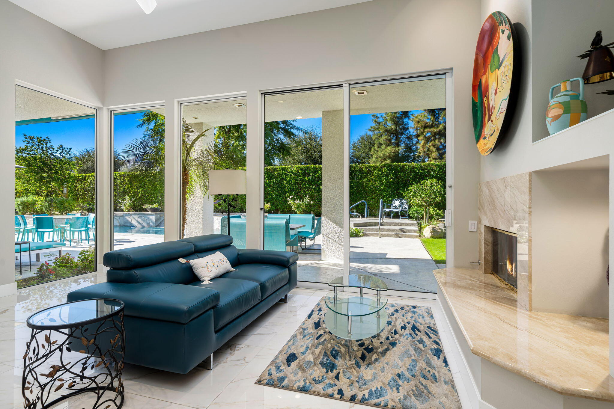 105 Waterford Circle Rancho Mirage, CA 92270 - Photo 62 of 76 a living room with furniture and a large window
