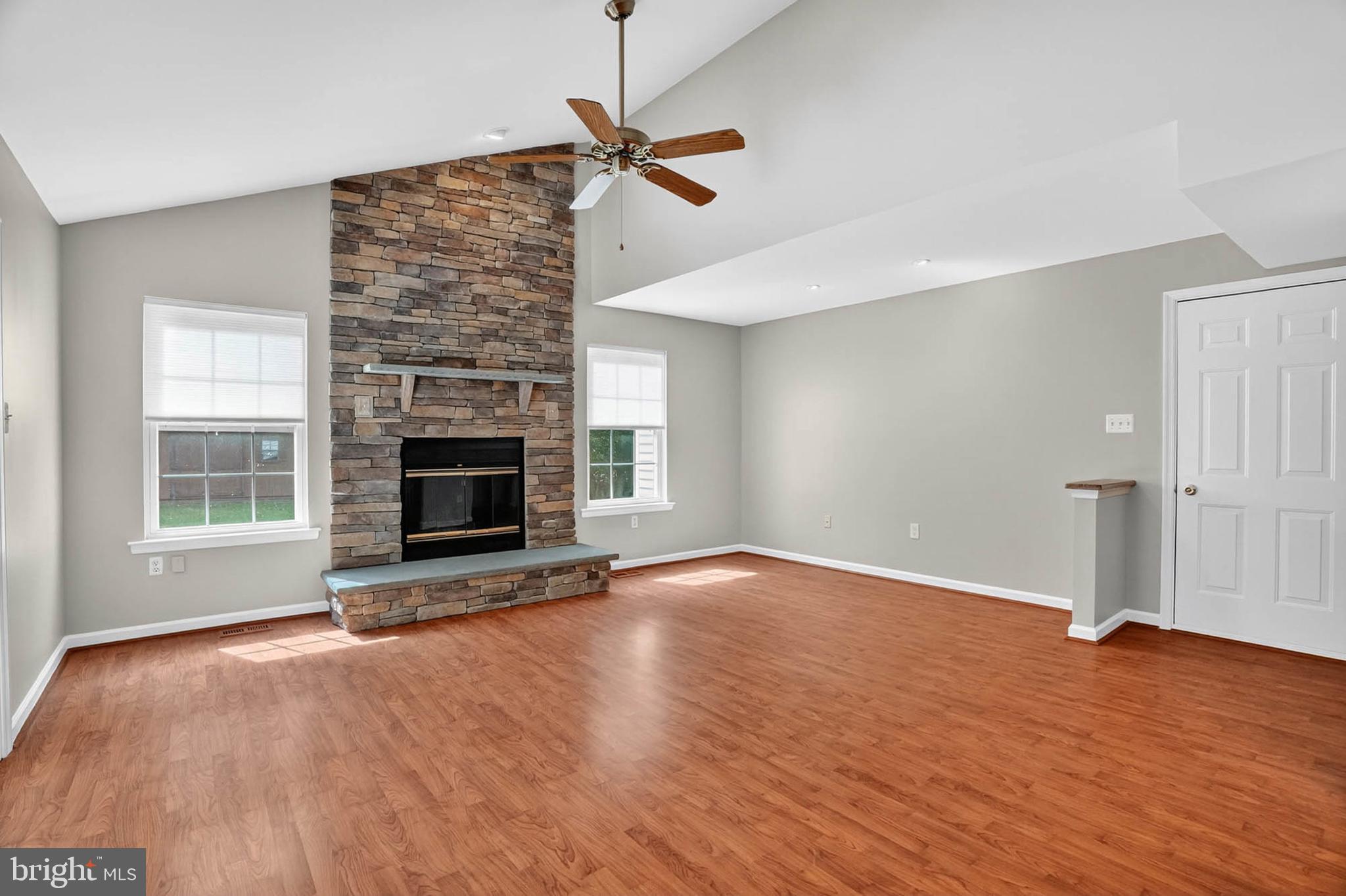 1749 Maple Avenue Hanover, MD 21076 - Photo 17 of 41 an empty room with windows fireplace and a sink