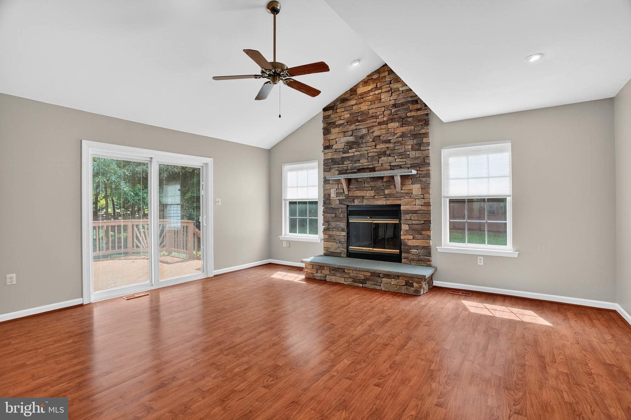 1749 Maple Avenue Hanover, MD 21076 - Photo 18 of 41 a view of empty room with wooden floor and fireplace