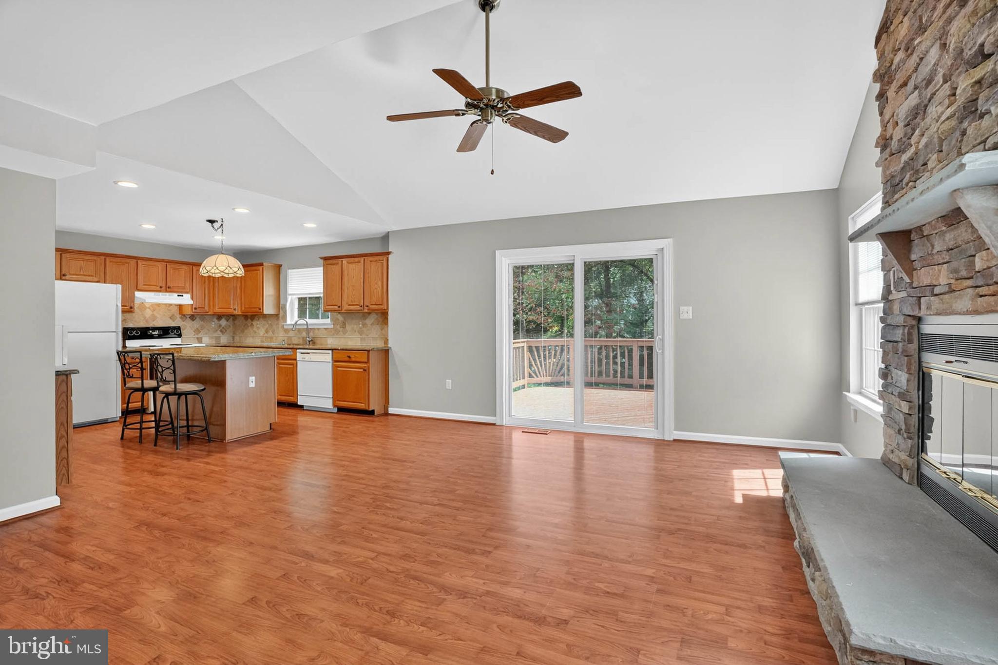 1749 Maple Avenue Hanover, MD 21076 - Photo 19 of 41 a view of an empty room with a window and kitchen view