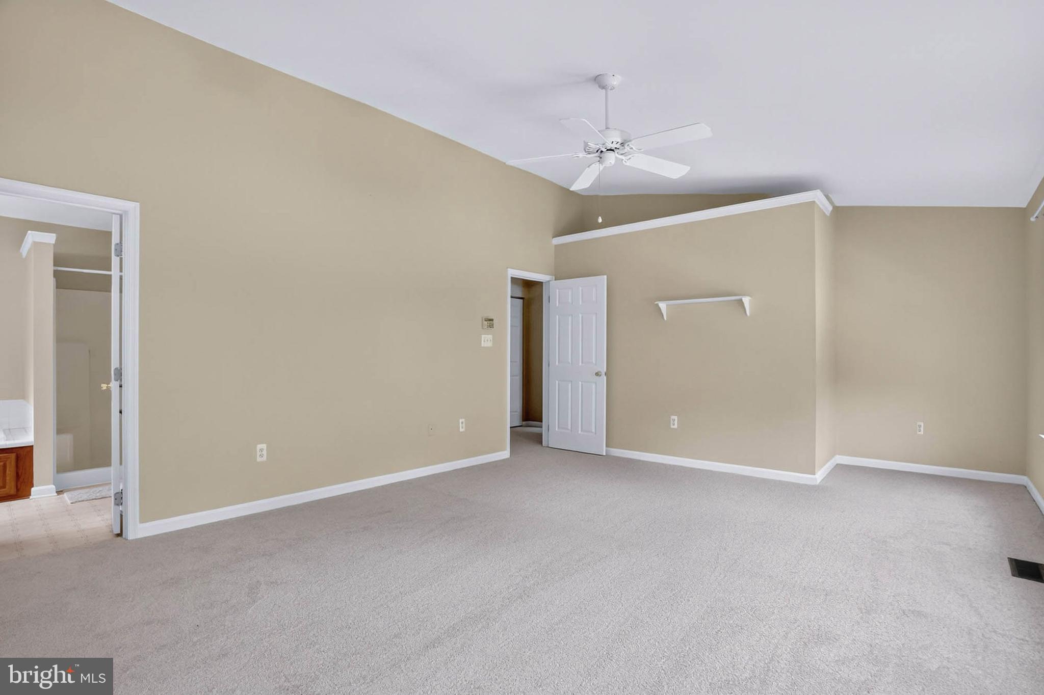 1749 Maple Avenue Hanover, MD 21076 - Photo 24 of 41 a view of an empty room with a ceiling fan