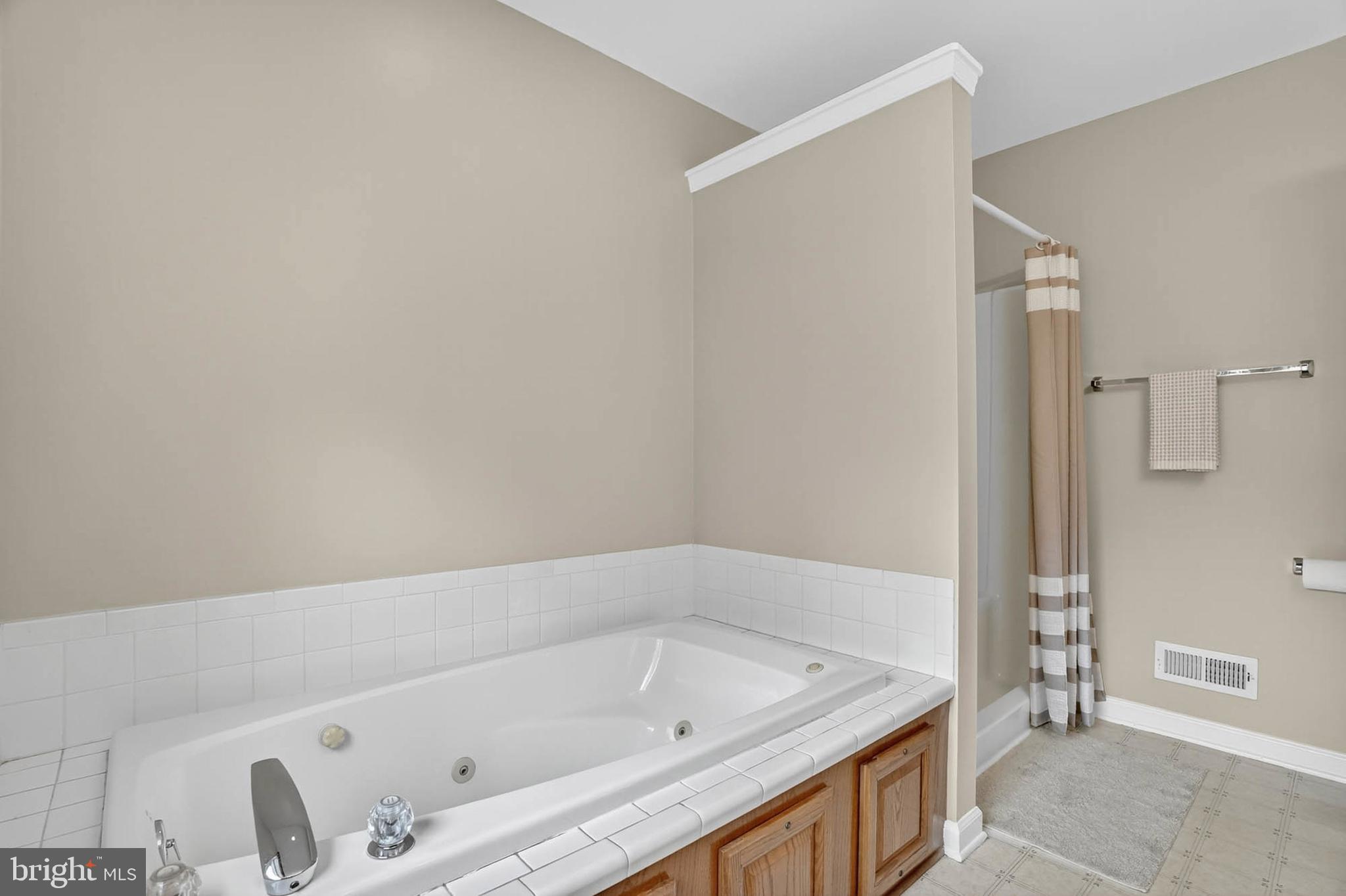 1749 Maple Avenue Hanover, MD 21076 - Photo 26 of 41 a bathroom with a tub and a sink