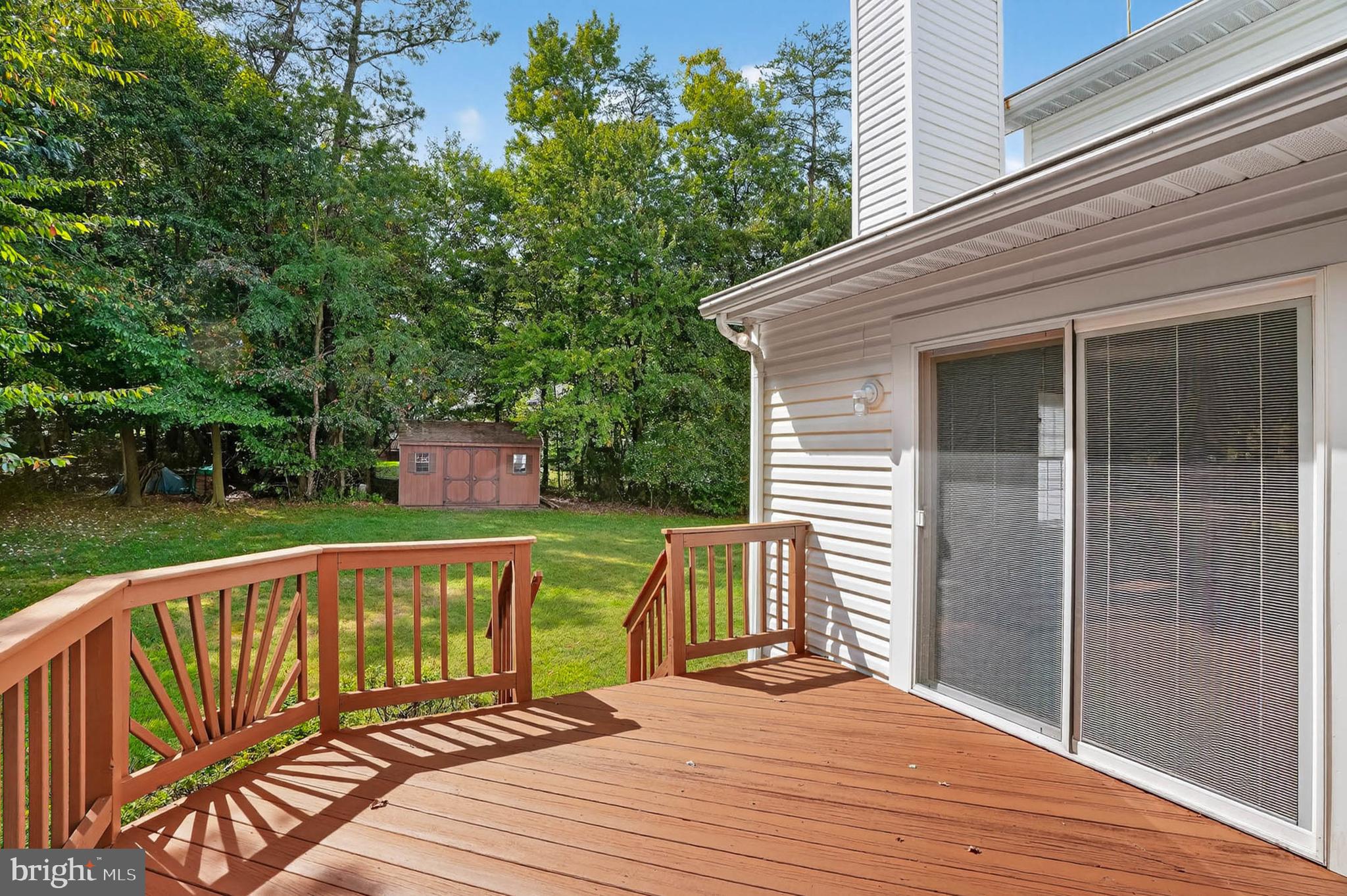 1749 Maple Avenue Hanover, MD 21076 - Photo 34 of 41 a balcony with view of trees in the background