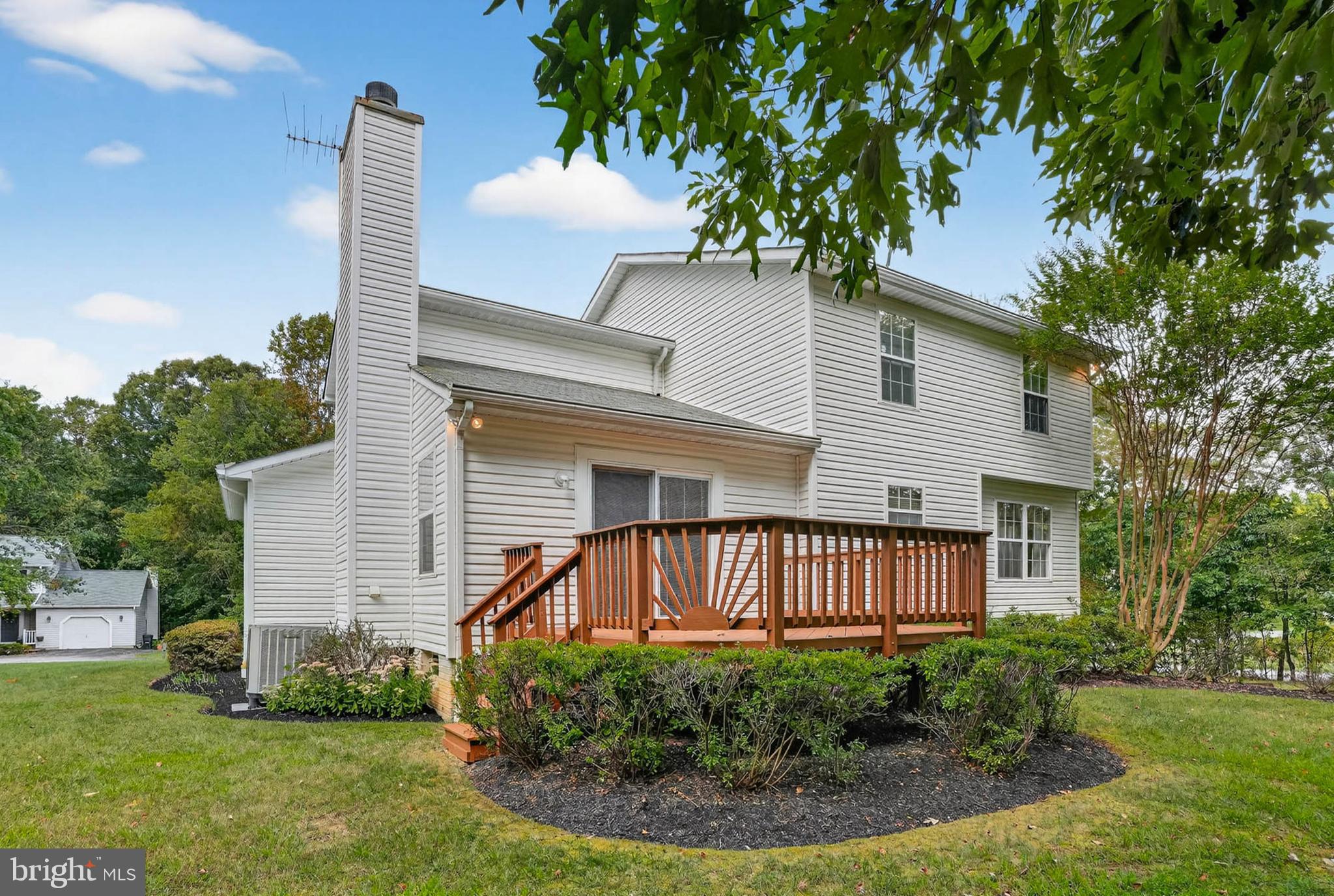 1749 Maple Avenue Hanover, MD 21076 - Photo 39 of 41 a view of a house with a yard and plants
