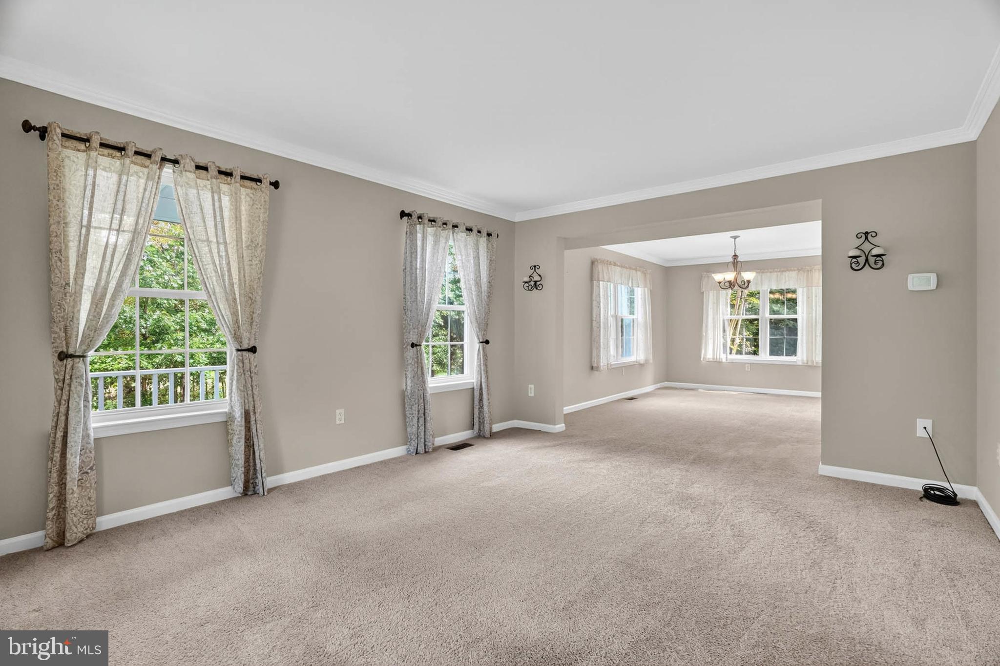 1749 Maple Avenue Hanover, MD 21076 - Photo 8 of 41 a view of a big room with windows and entryway chandelier