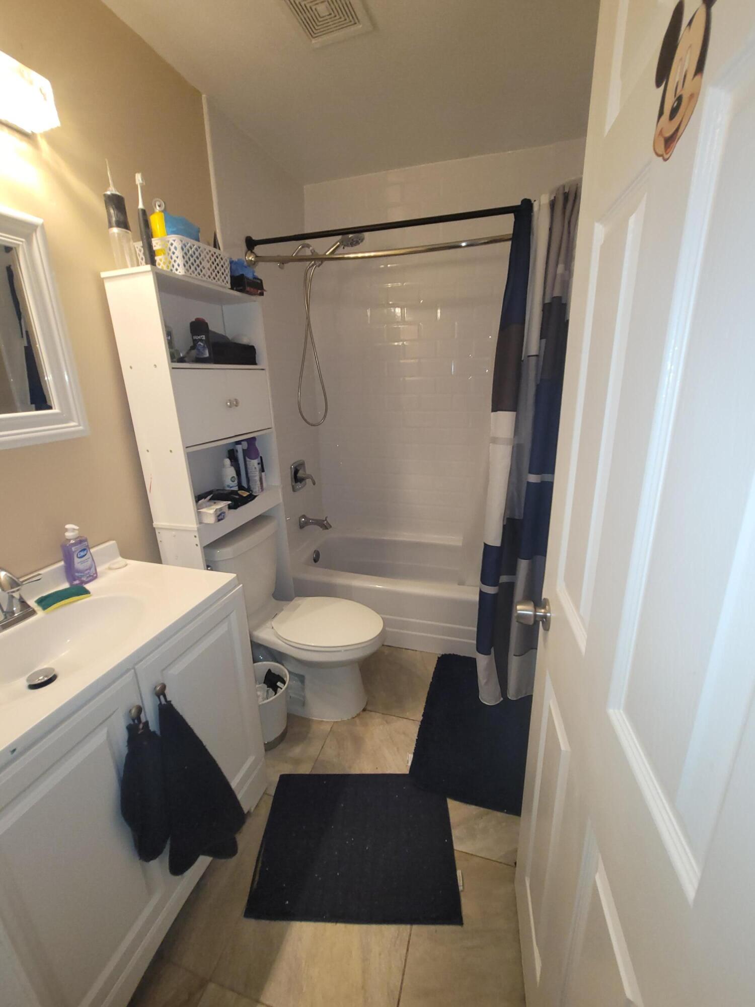 8448 Northwest 196th Terrace Hialeah, FL 33015 - Photo 24 of 67 a bathroom with a sink toilet and shower