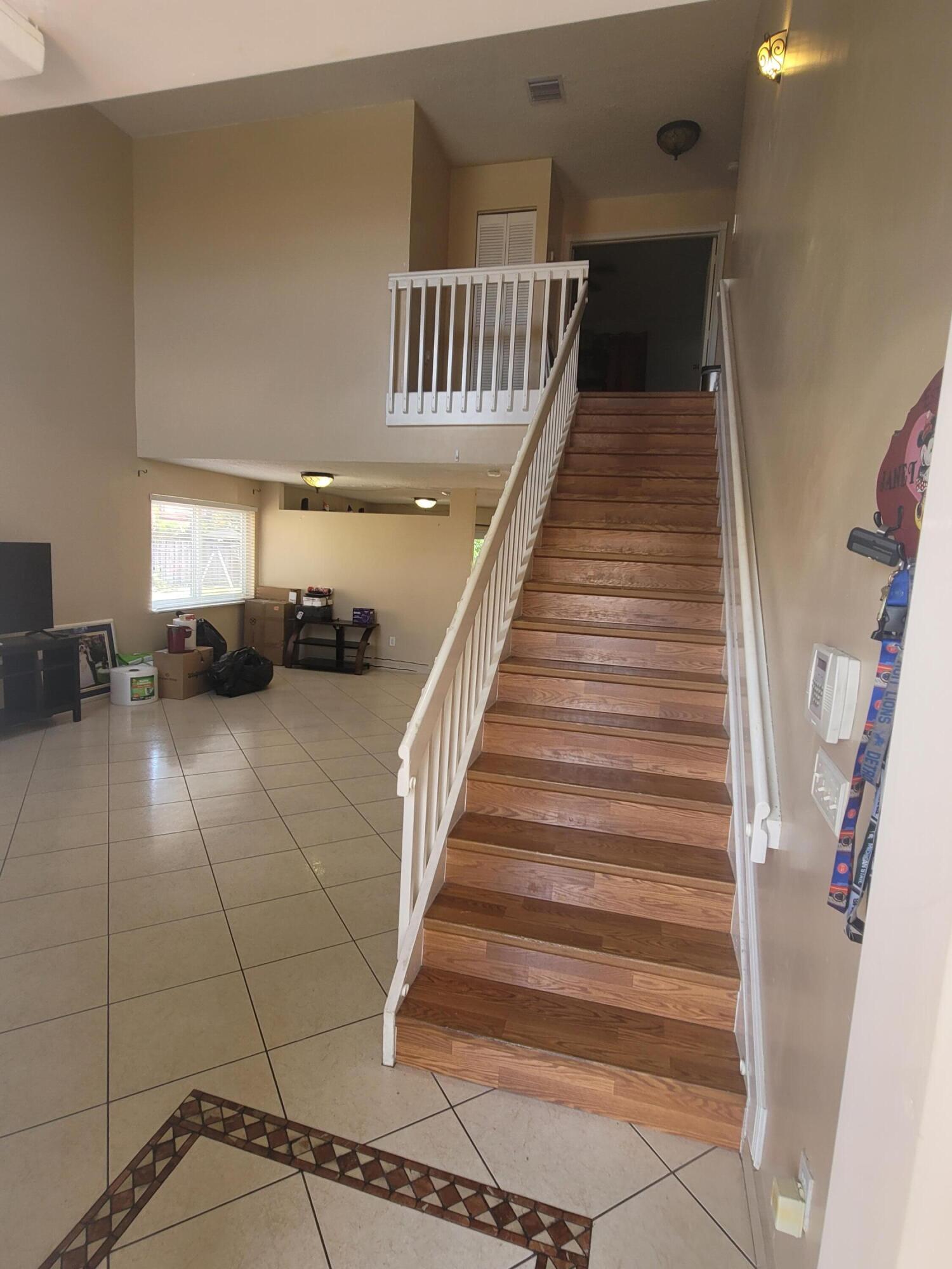 8448 Northwest 196th Terrace Hialeah, FL 33015 - Photo 5 of 67 a view of entryway and hall