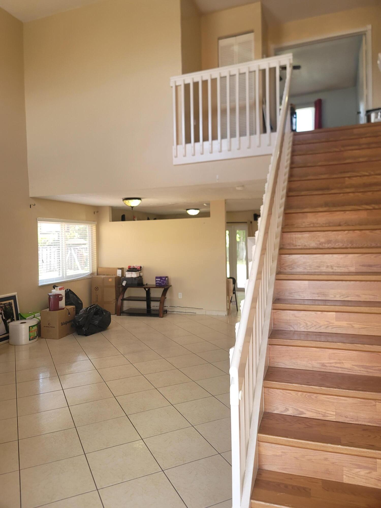 8448 Northwest 196th Terrace Hialeah, FL 33015 - Photo 6 of 67 a living room with furniture
