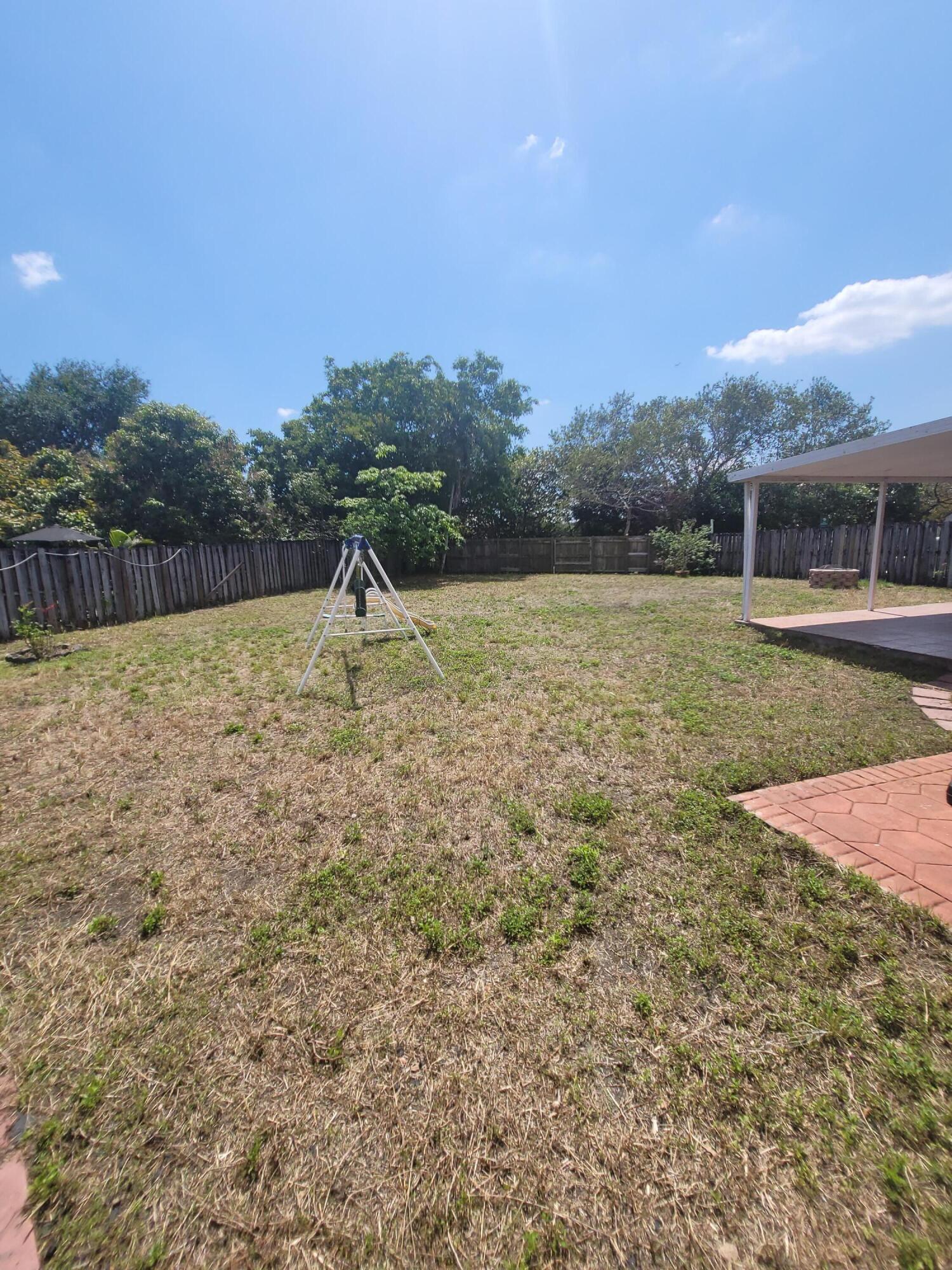 8448 Northwest 196th Terrace Hialeah, FL 33015 - Photo 62 of 67 a view of a field with an ocean