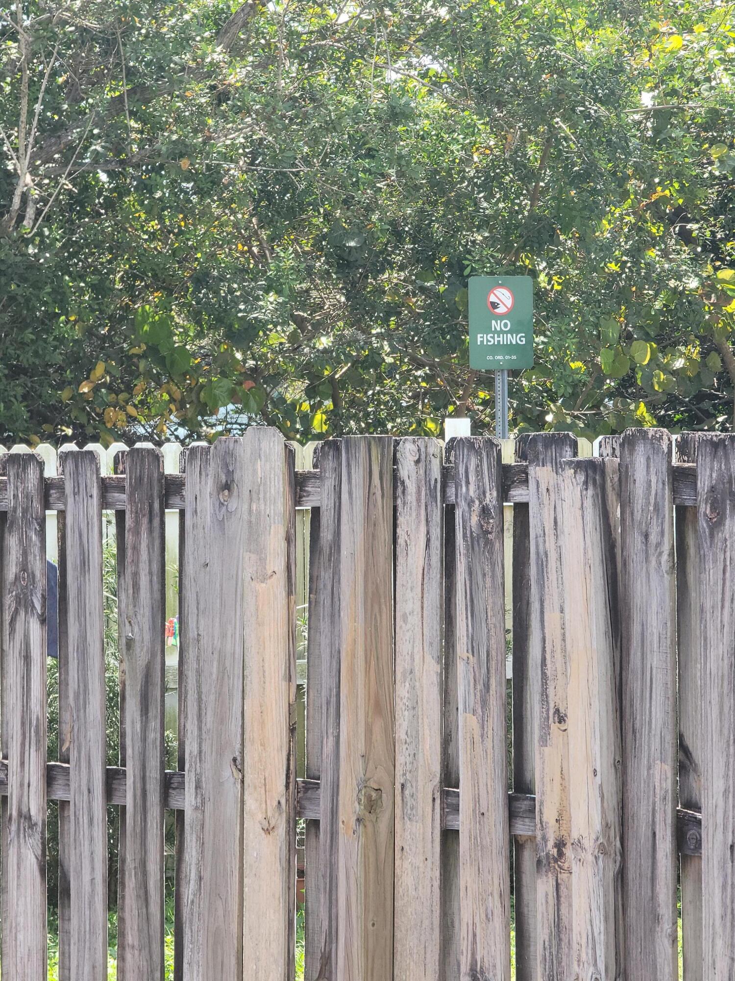 8448 Northwest 196th Terrace Hialeah, FL 33015 - Photo 64 of 67 a view of wooden fence with a wooden fence