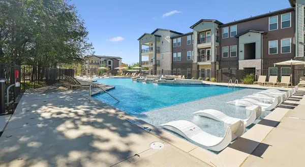 a view of a patio with a yard