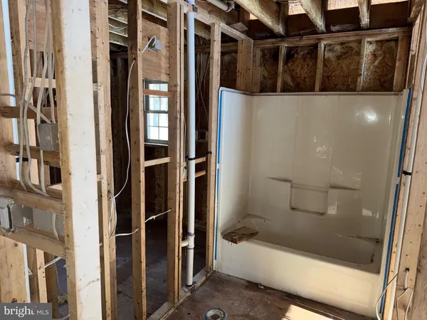 a view of a bathroom with a glass door