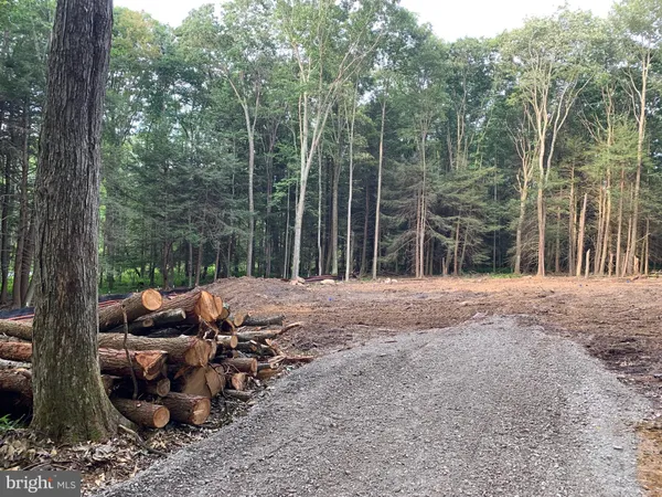 a childrens park with lots of swings and slides
