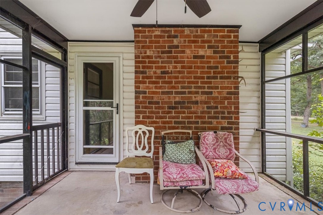 20101 River Road Chesterfield, VA 23838 - Photo 15 of 44 Screened porch featuring a concrete floor, red bri
