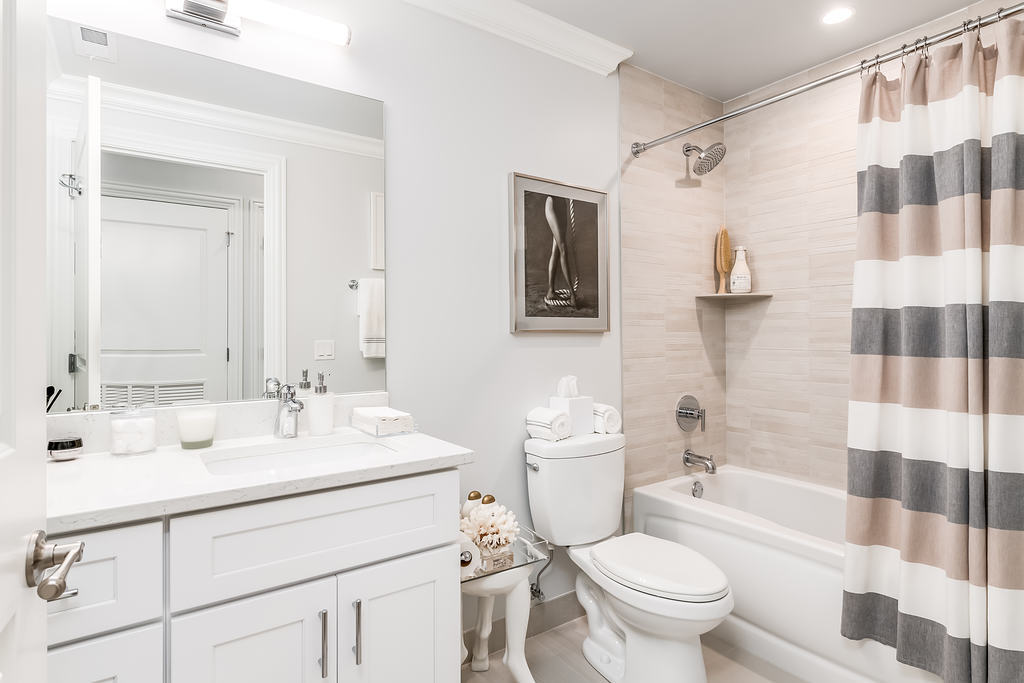 7652 Madison Street, Unit 304 Forest Park, IL 60130 - Photo 11 of 19 a bathroom with a sink toilet and shower
