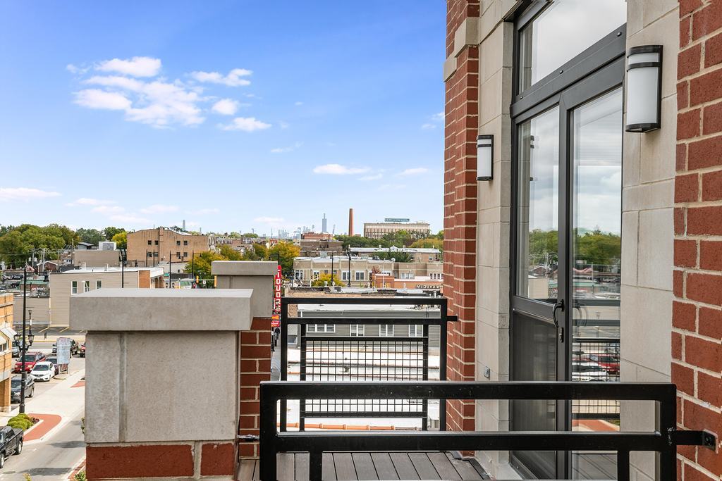 7652 Madison Street, Unit 304 Forest Park, IL 60130 - Photo 19 of 19 a view of a balcony with city view