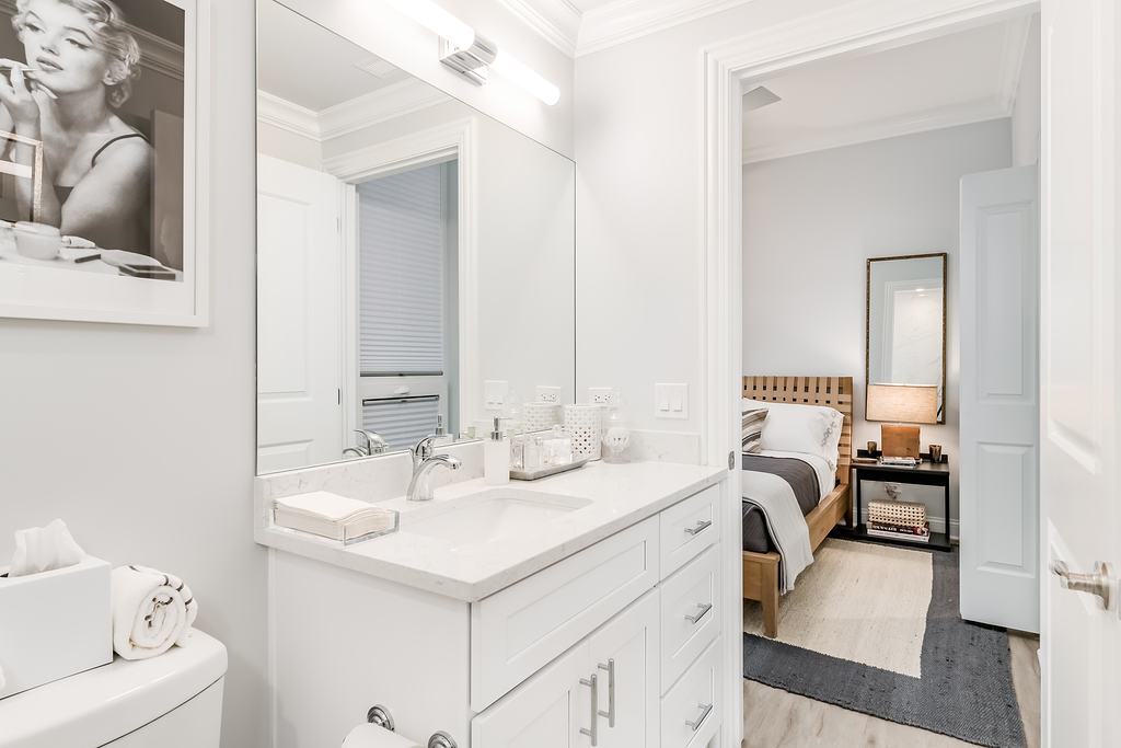 7652 Madison Street, Unit 304 Forest Park, IL 60130 - Photo 10 of 19 a en suite bathroom with 2 sink and a mirror