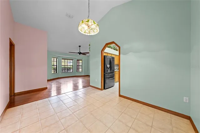 a kitchen with stainless steel appliances kitchen island granite countertop a sink and cabinets