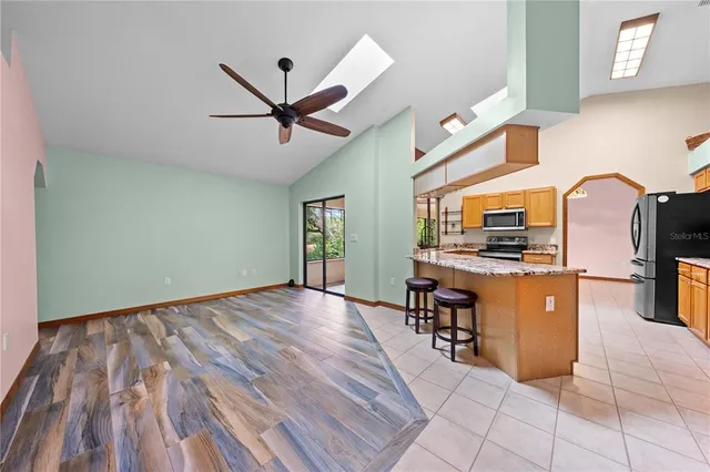 a view of room with window and hardwood floor