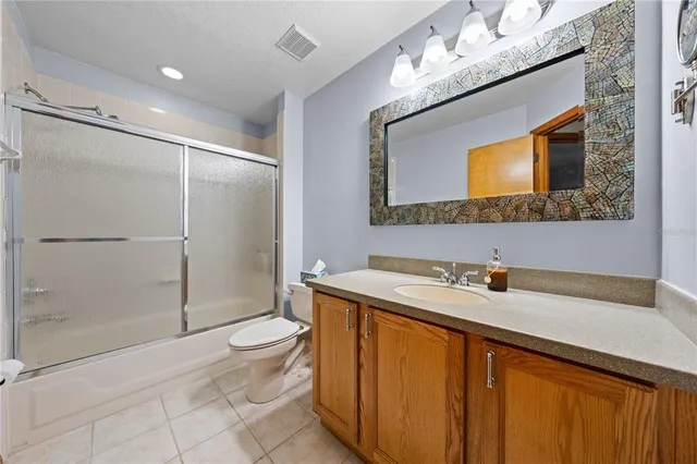 a view of a backyard with a patio