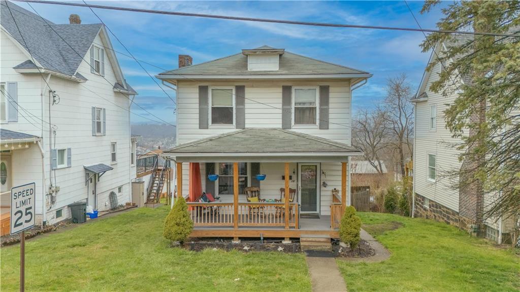 210 Wallula Avenue Butler, PA 16001 - Photo 1 of 33 a front view of a house with a yard table and chairs